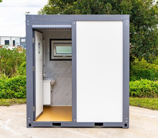 Toilet and Shower Container.jpg Toilet and Shower Container.jpg
